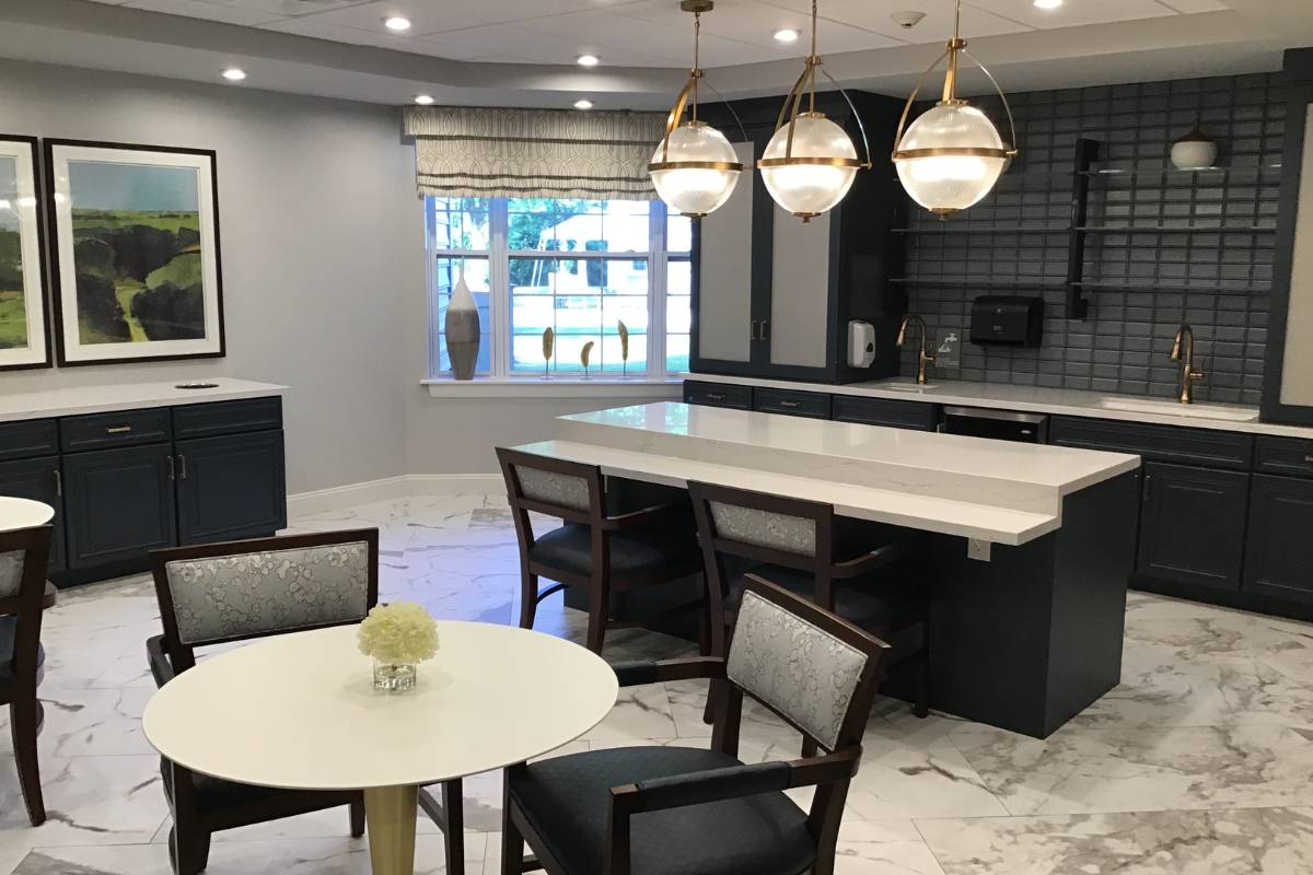 A modern coffee bar with bar and table seating